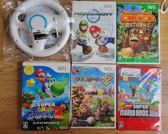 5 Japanese Wii games, Mario Kart, Super Smash Bros, New Super Mario Bros  etc.