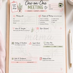 May include: A printable One-on-One Meeting template on a clipboard. The document features sections for meeting details, purpose, wins, strengths, topics, challenges, support needed, action plans, goals, development, and follow-up notes with icons.