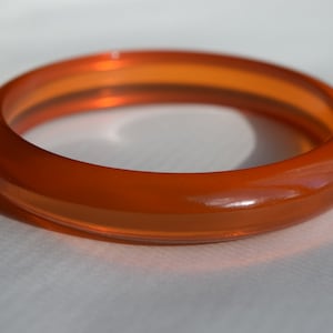 bakelite bracelet vintage orange transparent prystal bangle orange ade jello glowing color!!  Rare Mid Century collectible jewelry