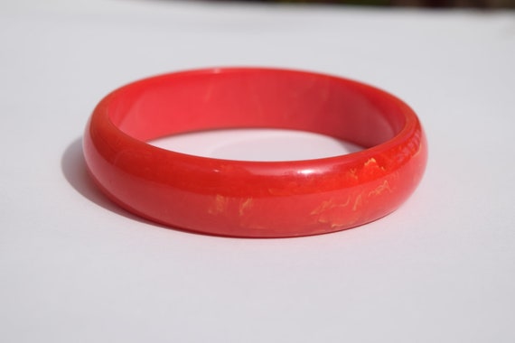 bakelite bracelet vintage bright orange bangle wi… - image 1