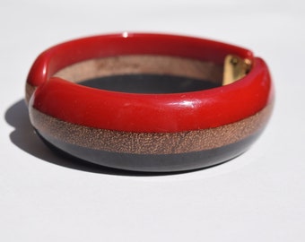 bakelite and wood vintage bracelet clamper style red black bakelite and wood laminate layer!  Lovely condition collectible jewelry rare!