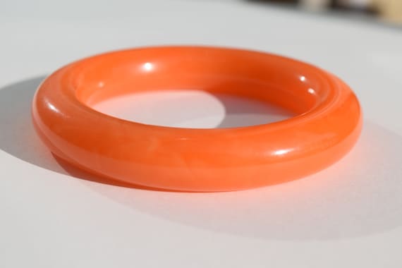 bakelite bracelet vintage orange marbled thick tu… - image 1