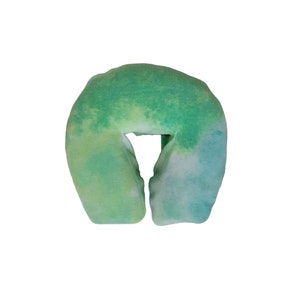 May include: A green and blue tie-dye fabric face cradle for massage therapy.
