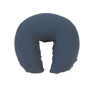 May include: A dark gray U-shaped massage pillow with a hole in the center for the neck.