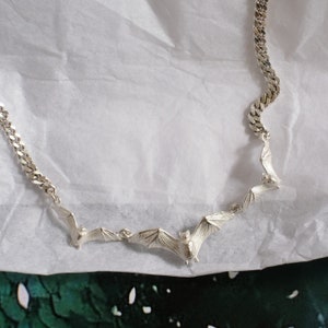N.248 - Collar triple murciélago