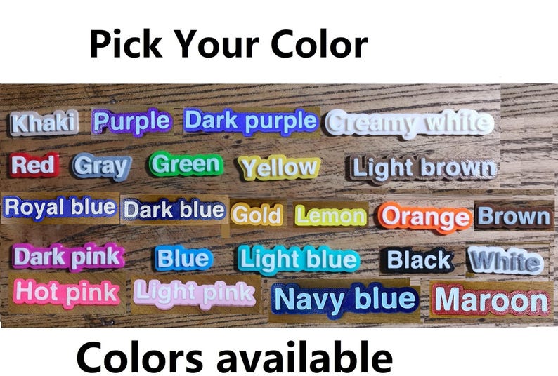 May include: Image displaying a variety of color options, each labeled on a rectangular block. Colors include Khaki, Purple, Dark Purple, Creamy White, Red, Gray, Green, Yellow, Light Brown, Royal Blue, Dark Blue, Gold, Lemon, Orange, Brown, Dark Pink, Blue, Light Blue, Black, White, Hot Pink, Light Pink, Navy Blue, and Maroon.