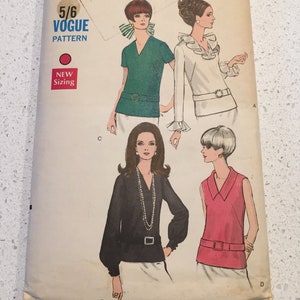 May include: Vintage Vogue sewing pattern number 7403 for a blouse with three different styles. The pattern is for size 12 with a bust measurement of 34 inches (86 cm).