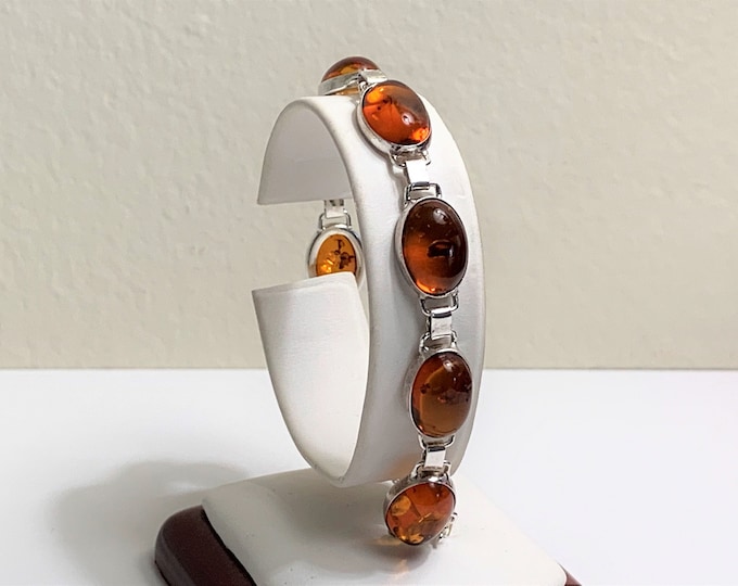 Vintage Sterling Silver Natural Baltic Cognac Amber Bracelet, 8 Oval Cabochon 14X10mm, 7" Long, Safety Chain, England. Free US Shipping.