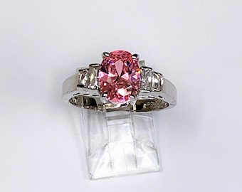 Sterling Silver - Rhodium Engagement Ring, Oval Cut Brilliant Pink  CZ 9 X 7 mm, Straight Colorless Baguettes, Size 8 1/4. Fee US Shipping