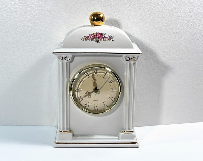 Paul Sebastian Porcelain Floral Quartz Mantle Clock. 22K Gold Accents, 1993 Limited Edition, 9” T. 5.5” W. Great Condition. Free US Shipping