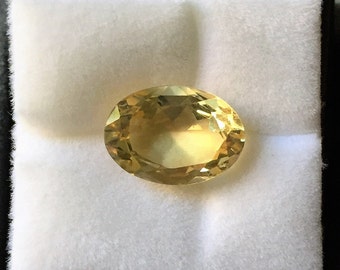 Genuine Natural Golden Citrine, Oval Fancy Cut Loose Gemstone 14.30 x 10.10 mm, 5.71 carats. Africa