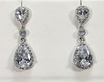 Sterling Silver Luxurious Dangle Earrings, Round & Pear Shape Cubic Zirconia, 35mm - 1 3/8" Long, Posts . 7.25 Grams. Free US Shipping. Nice