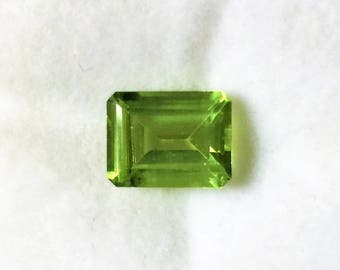 Genuine Natural African Green Peridot, Fine Emerald Cut Loose Gemstone, 9.10 X 7.10 mm, 2.26 carats. IF-AAA. Free US Shipping.