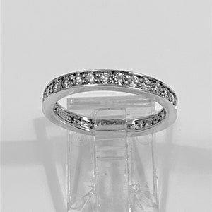 Eternity Band, Sterling Silver with Rhodium, Channel Set Round Brilliant CZ, 1 carat Total Weight, Size 5 1/2. Beautiful