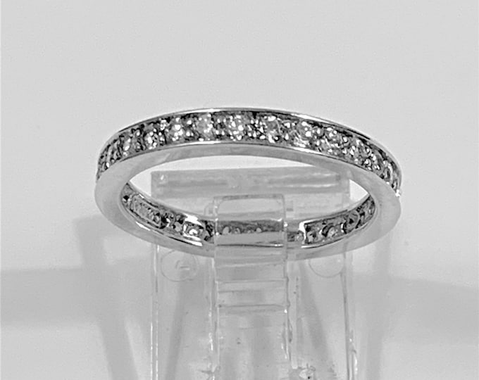 Eternity Band, Sterling Silver with Rhodium, Channel Set Round Brilliant CZ, 1 carat Total Weight, Size 5 1/2. Beautiful