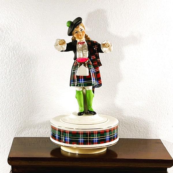 Vintage Schmidt® "Blue Bells Of Scotland" Music Box, Porcelain Rotating Figurine Of A Scottish Girl, 8" T. 4.25" Diam. Free US Shipping.