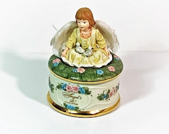 Angel’s Love by Dona Gelsinger, ©1999 Ardleigh Elliott 74014 Music Box Collection, Plays “Cherish”, 5” T. 3.25” Base. Free US Shipping.