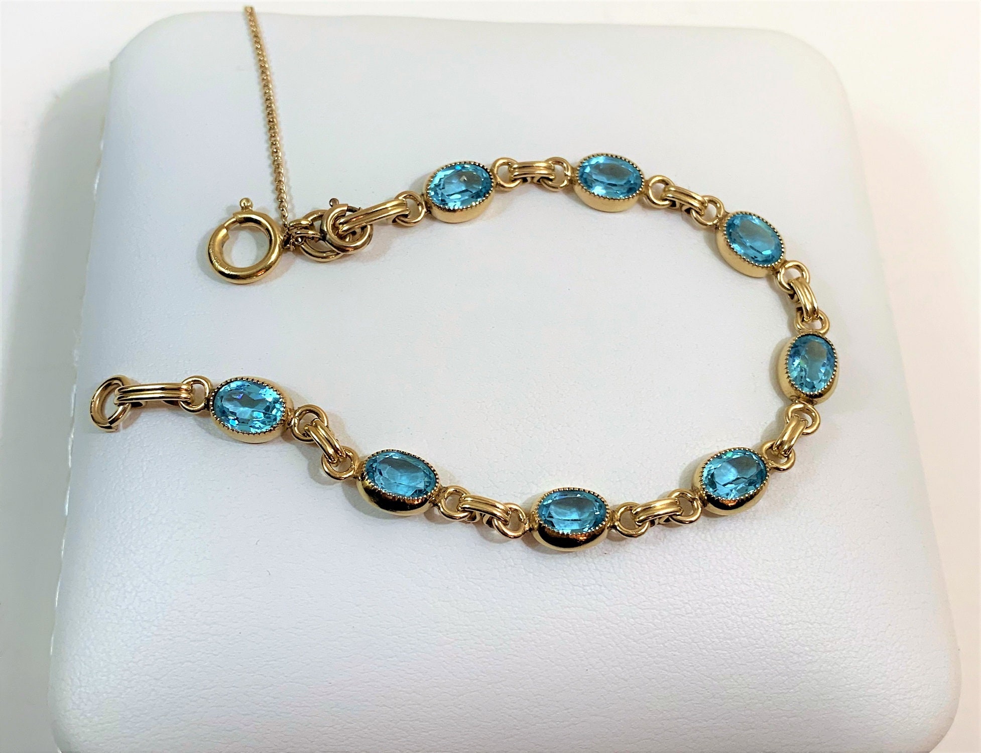 Vintage 12K Gold Filled and Blue Topaz Bracelet, 8 Oval Faceted 8X6mm