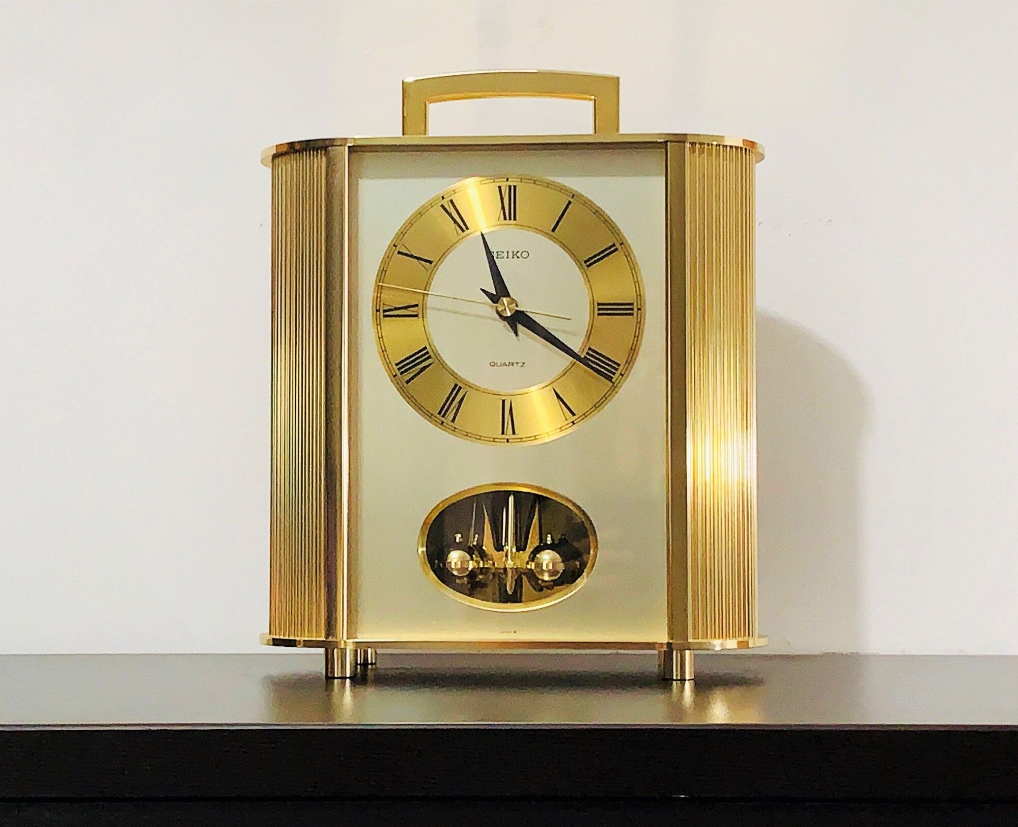 Seiko Limited Carriage Brass & Brass Finish Case Rotating Pendulum Quartz  Clock, #QQ2186G.  H. 9 W. Mint Condition, Free US Shipping.