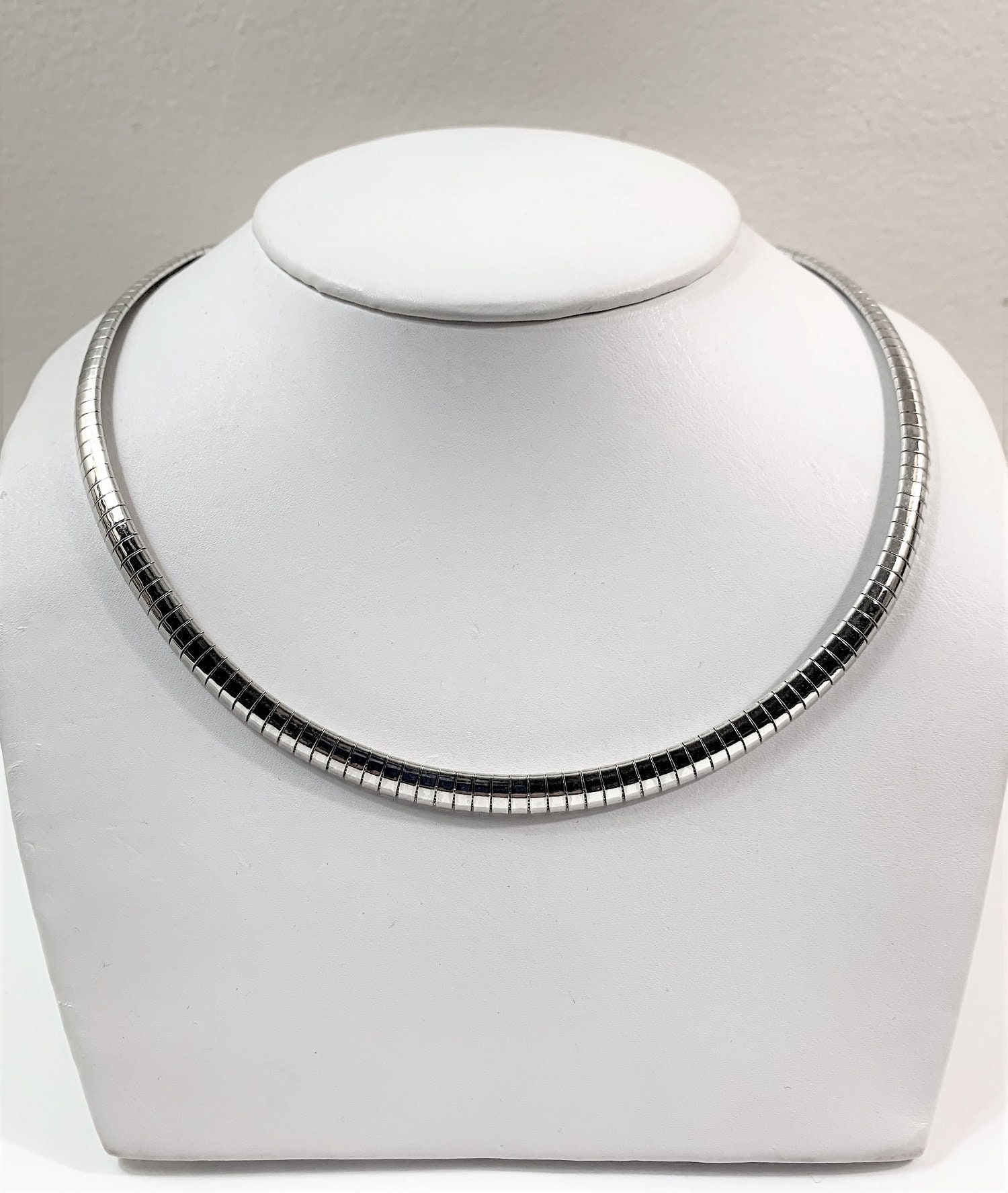 Omega necklace silver deals
