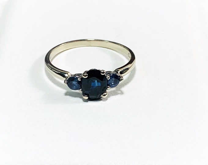 10K White Gold Natural Ceylon Blue Sapphire Ring, Center 7X5mm - .85 ct. Sides 3mm .32 ct. TW. Size 6.75. Free US Shipping