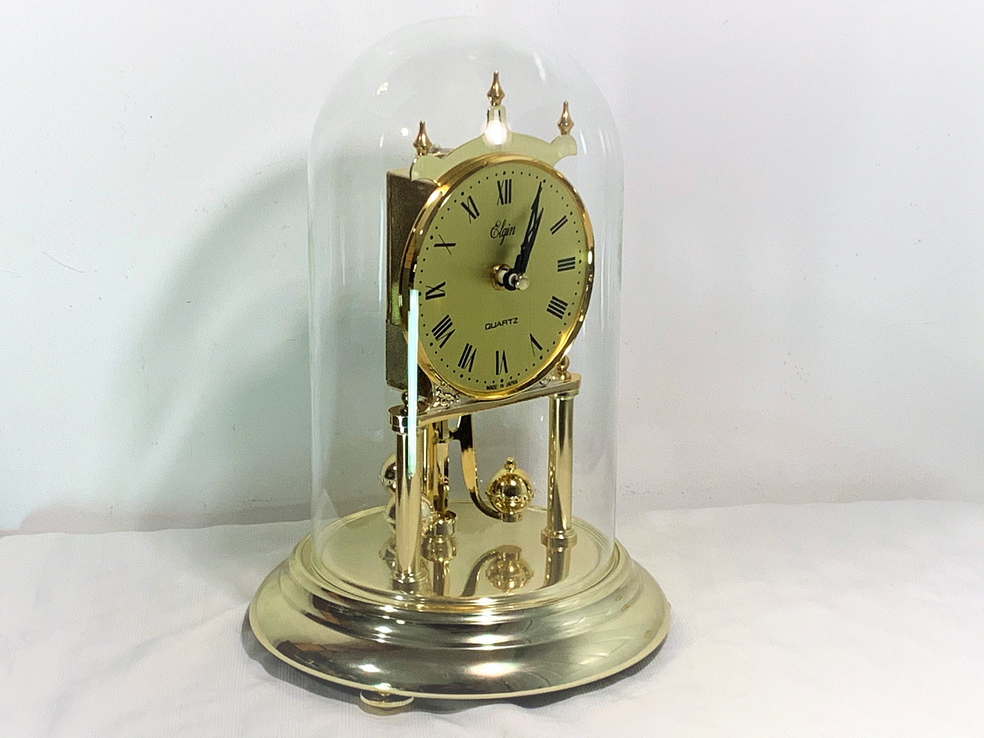 Elgin Japan Large Size Anniversary Clock, Glass Dome, Brass & Brass