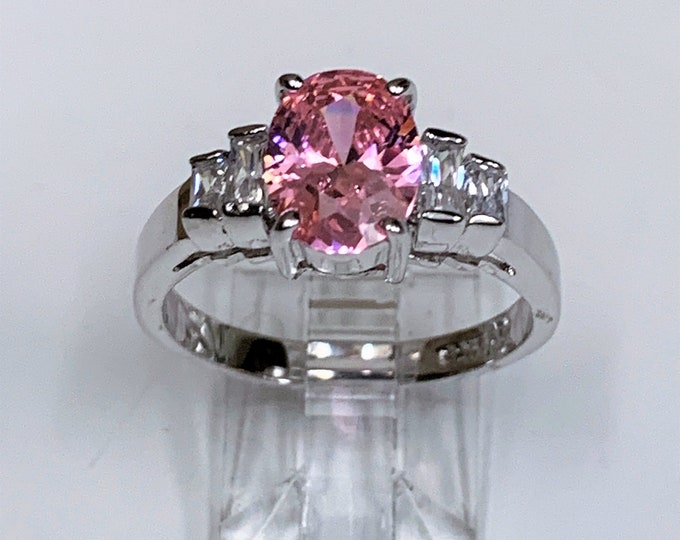 Sterling Silver - Rhodium Engagement Ring, Oval Pink Full Cut CZ 9X7 mm, Accenred with Straight Colorless Baguettes, Size 8 1/4