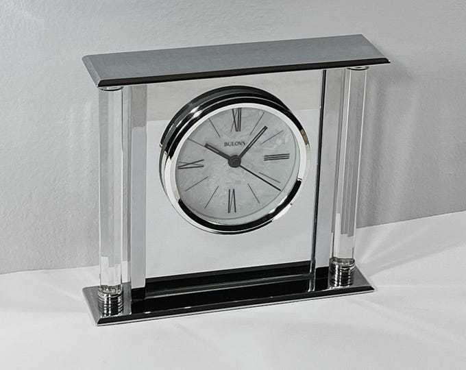 Bulova™ Accurate Quartz Sweep Seconds Hand, Polished Mirrored Stainless Steel, Crystal Columns, 3.5" MOP Dial, 7" W. 6" T. Free US Shipping