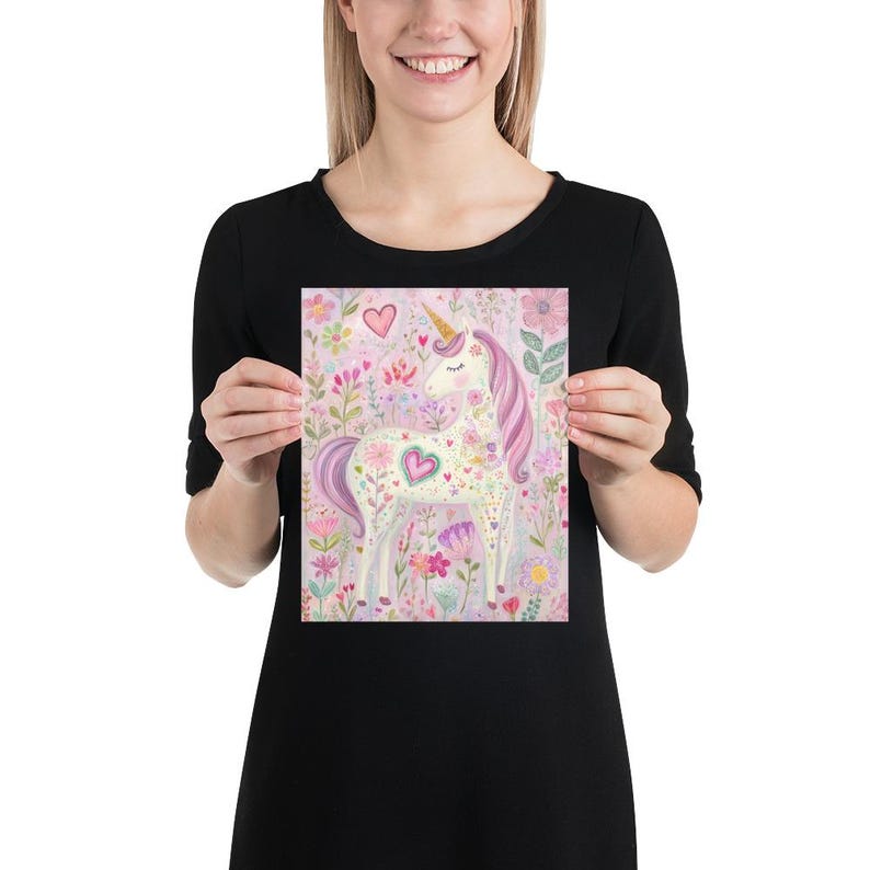 May include: A whimsical print featuring a unicorn with a golden horn and flowing pink mane and tail, surrounded by colorful flowers and hearts. The artwork has a soft, pastel color palette, creating a dreamy and enchanting scene.