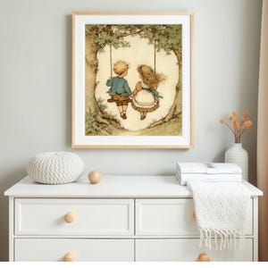 May include: A framed print depicts two children on a swing under a tree. The boy wears a blue jacket and brown pants, while the girl has a white dress with a blue bow. The artwork has a vintage, storybook style.