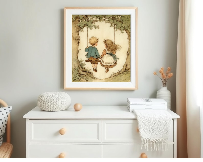 May include: A framed print depicts two children on a swing under a tree. The boy wears a blue jacket and brown pants, while the girl has a white dress with a blue bow. The artwork has a vintage, storybook style.