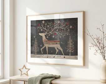 May include: A framed wall art print featuring a beige deer with large, intricate antlers decorated with red flowers and white snowflakes. The deer stands on a snowy ground against a dark gray background with two stylized trees and falling snow.