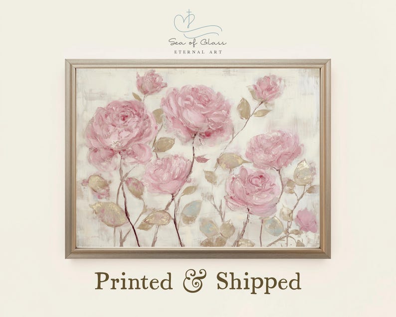 May include: A framed floral print featuring a soft, painterly depiction of pink roses. The artwork has a neutral background and is accented with muted green and gold leaves. The text "Sea of Clair Eternal Art" is at the top, and "Printed & Shipped" is at the bottom.