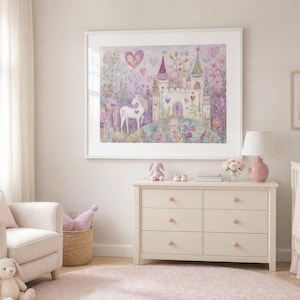 May include: A framed wall art print featuring a whimsical illustration of a white unicorn standing on a grassy hill next to a large castle, surrounded by pink hearts, colourful trees, and flowers in shades of purple, pink, and soft green.