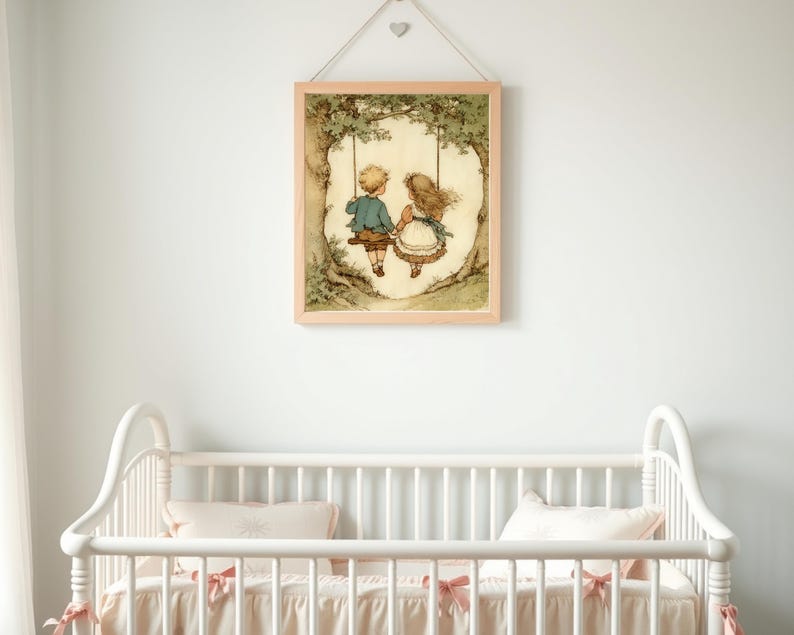 May include: A framed print of two children on a swing, set against a backdrop of a tree. The artwork features soft colors and a vintage aesthetic. The print is displayed above a white crib with pink bows.