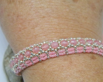 Pink and silver hand-woven bracelet