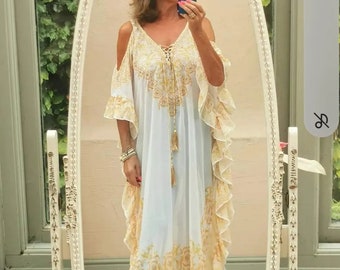 The beautiful , Bianca, white and gold coloured , frill , cold shoulder , maxi kaftan dress in georgette with crystal detail