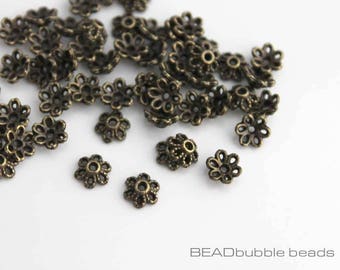 Cappucci con perline a fiore in bronzo da 6 mm di diametro