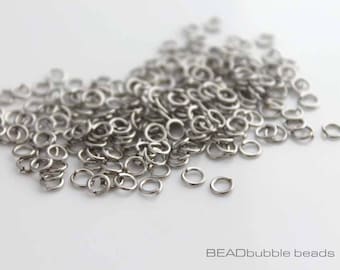 Anelli aperti color argento anticato da 4 mm: componenti per la creazione di gioielli, confezione da 200