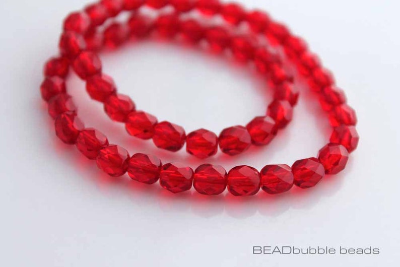 Czech Fire Polished Round Faceted Glass Beads in Siam color dark red