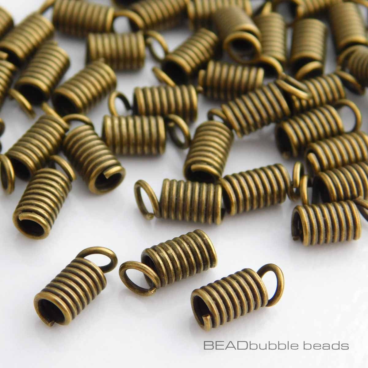 200pcs Metal Alloy Spring Coil Ends Crimp Fasteners Leather Cord Ends Caps for DIY Handmade Ornaments Jewelry Making 9×5mm Hole 3.5mm Coil Cord Ends 