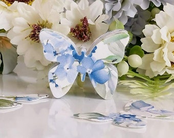 Blaue Wildblumen-Samenpapier-Schmetterlinge | Zartblaue bedruckte Blumen | Platnierbare Mini-Gefälligkeiten | 1,5" B x 1,25" H - Set mit 50 Stück