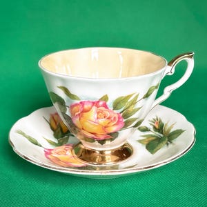 Vintage Paragon 'Peace' rose tea cup and saucer: 1960s fine bone china