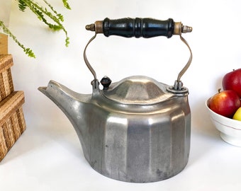 Large American aluminium stove kettle, with swivel lid and wooden handle, early 20th century