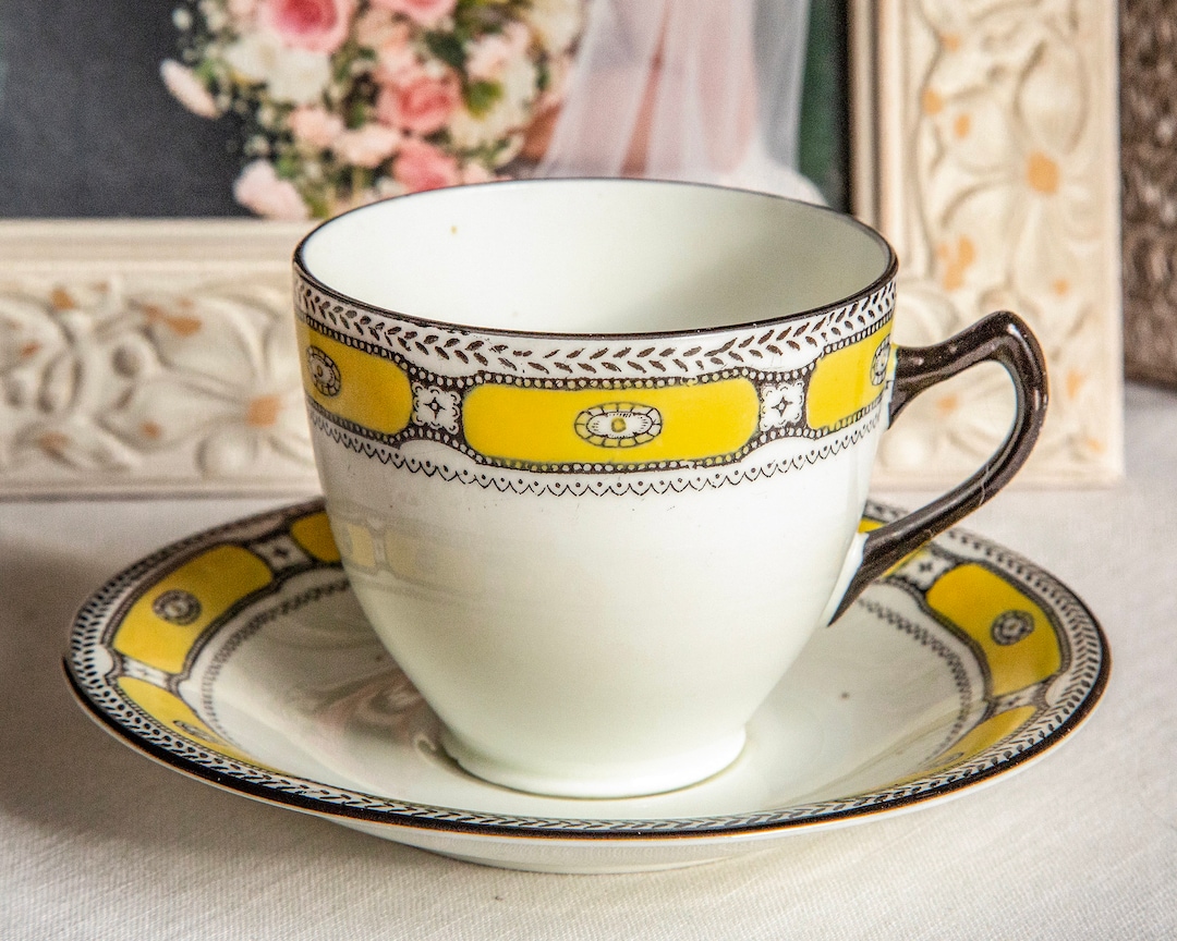 Early Art Deco Tea Cup and Saucer, With Black and Yellow Banding