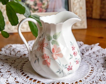 Small Wedgwood 'Buttermere' milk jug, white with pink flowers, 10cm / 4 inches high, 1980s