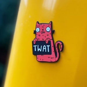 Swear Word Red and Black Cat Fridge Magnet holding funny sign. Designed by Katie Abey in the UK