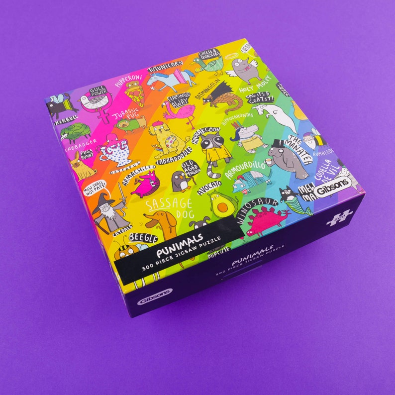 puzzle box with featuring illustrations by Katie Abey on a purple background