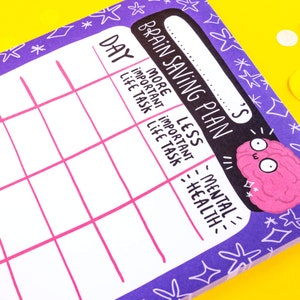 A5 brain saving planner pad mental health planner with blue graphic print designed by Katie Abey in the UK