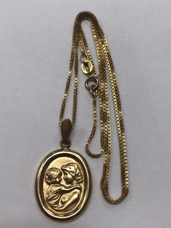 mother and child pendant gold